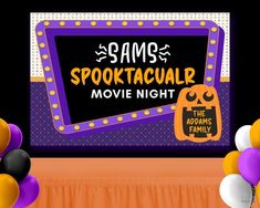 a sign that says samo spooktacular movie night with balloons around it