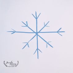 a snowflake is shown in the sky on a clear day