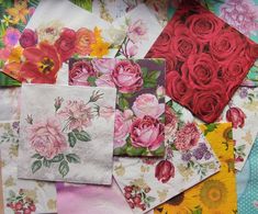 there are many different flowers on the table cloths that have been made into napkins