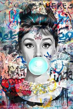 a woman with a bubble in her mouth and graffiti on the wall behind her,