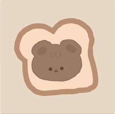 a piece of bread with a bear face on it