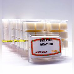 several wax melts in plastic containers with labels for weather weather and heater on them