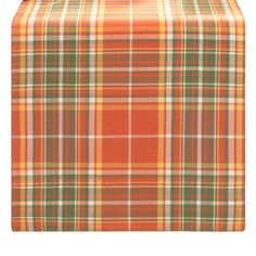 an orange and green plaid table runner