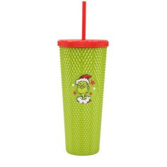 a green cup with a red lid and straw in the shape of an elf on it