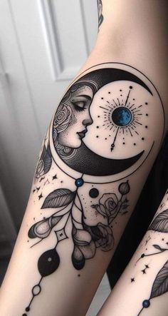 two tattoos on both legs with the moon and stars above them, one has a blue eye