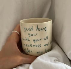 someone is holding a coffee cup with writing on it and the words, just have you with your all heartness and life's my love