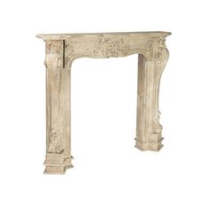 an old white fireplace surround with carvings on the top and bottom, against a white background