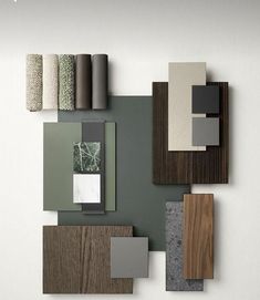 an assortment of different colors and materials arranged on a wall