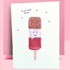 a handmade card with an ice cream popsicle drawn on it and the words to a fab mum