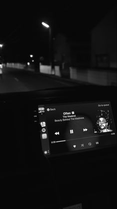 the dashboard of a car at night time