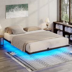 a bed with blue lights on the floor in a room next to a book shelf