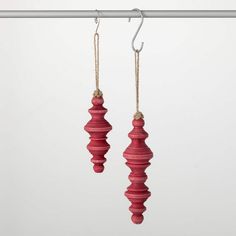 Bring a touch of classic charm to your Christmas decor with these rustic red wooden finials exclusively from Sullivans Home Decor. Carefully crafted, these finials are perfect for topping curtains, mantels, or tree branches to add old-world character. Handcrafted from durable wood and painted in a vibrant Christmas red, these finials may become your most treasured holiday heirlooms. Their timeless style ensures they'll complement your seasonal decorating for years to come. After all, isn't build Wooden Finials, Spindle Crafts, Novelty Decor, Sound Room, Indoor Holiday Decor, Frosted Tree, Turning Projects, Cabin Christmas, Red Wood