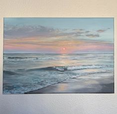 a painting of the sun setting over the ocean