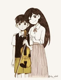 two people are standing next to each other with a violin