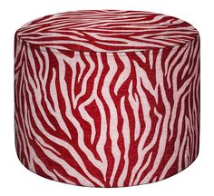 a red and white zebra print stool