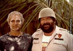 two men standing next to each other with mud on their faces and the words bud spencer above them