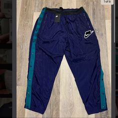 Nike Men’s Sportswear Nsw Woven Break Away Pants Blue Size 2xl Bv4546-498 Nwt. 100% Nylon. Men’s Size 2xl. Color Is Dark Blue/Green. Condition Is "New With Tags". Shipped With Usps Priority Mail. Nylon Pants Outfit Men, Nike Blue Parachute Pants, Nylon Pants Outfit, Nike Blue Nylon Bottoms, Nike Nylon Streetwear Pants, Navy Blue Nike Track Pants, Nike Track Pants Mens, Mens Nike Sweatpants, Nike Pants Mens