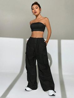 Introducing our Tube Top and Drawstring Waist Cargo Pants, the perfect combination of style and comfort. The strapless knitted fabric top showcases a chic and versatile design, while the woven fabric pants feature a drawstring waist and an array of pockets for practicality. With a regular fit and non-stretch fabric, these pants offer a flattering silhouette. Details: Details: Drawstring, Pocket Neckline: Strapless Tops Material: Knitted Fabric Pants Material: Woven Fabric Tops Composition: 94% P Casual High Waist Stretch Tube Top, Versatile Bandeau Bottoms For Spring, Casual Bandeau Tube Top With Elastic Waistband, Casual Bandeau Tube Top, Waist Cargo Pants, Fabric Pants, Trendy Denim, Strapless Tops, Casual Denim