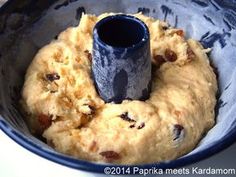 a blue bowl with some food inside of it