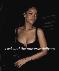 a woman in a black dress standing next to a car with the words i ask and the universe delivers