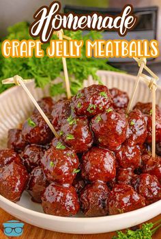 homemade grape jelly meatballs in a bowl with toothpicks