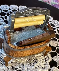 an old fashioned shaving machine on a doily