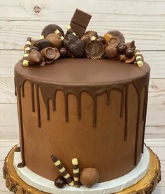 a chocolate cake with candy and candies on top