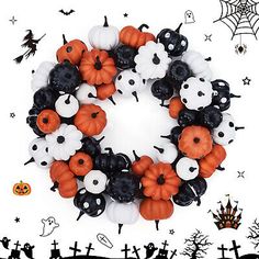 a halloween wreath made out of plastic pumpkins and black and white spider webs