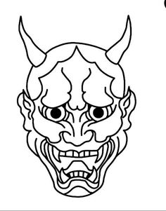 a demon mask with horns on it's head