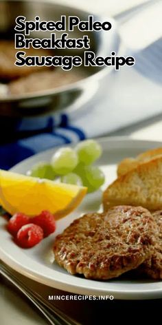 a plate with pancakes, fruit and bread on it that says spiced paleo breakfast sausage recipe