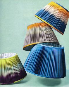 an article in the magazine about artful marriage with colorful lampshades and pleated lampshades