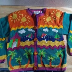 Vintage Marisa Christina Classics Hand Knit Beach Theme Pattern Cardigan Sweater, Size Medium - Measures p2p=21" Length=22" - Has Shoulder Pads (Pictured) - Shoulder Pads Are Very Easy To Remove - Please Inquire For This Service - Extra Fee) Excellent Condition, No Flaws Vintage Sweater For Fall Holiday, Vintage Sweater For Holiday And Fall, Fun Multicolor Long Sleeve Cardigan, Vintage Multicolor Knit Cardigan, Multicolor Vintage Knit Cardigan, Pendleton Flannel, Pattern Cardigan, Adventure Shirt, Collared Sweatshirt