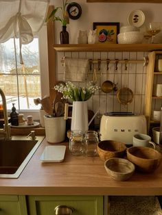 the kitchen counter is clean and ready to be used for cooking or baking, as well as other items