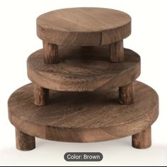 three wooden stools stacked on top of each other with the words color brown above them