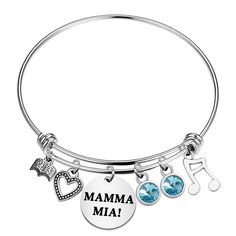 a silver bracelet with charms that says mama mia and music notes on the side,