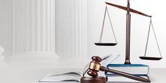 a judge's gavel and books on a table