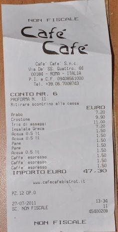 a receipt for cafe cafe sitting on top of a table