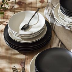 black and white dinnerware set on wooden table