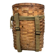 a large woven basket with straps on it