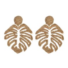 a pair of gold toned earrings with large leaves on the front and back of them