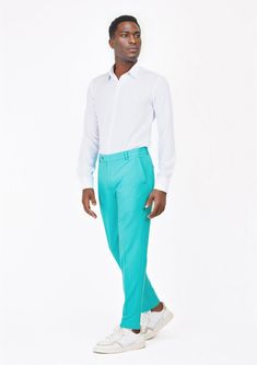 Be bold in our Aqua Blue Stretch Pants. Made with a stretch cotton fabric, these custom made pants will move with you and stand out wherever you go. Blue Slim Fit Straight Dress Pants, Blue Slim Fit Straight Pants, Blue Slim Fit Ankle-length Dress Pants, Slim Fit Blue Ankle-length Dress Pants, Blue Fitted Tapered Leg Pants, Fitted Blue Chinos With Straight Leg, Fitted Straight Leg Blue Chinos, Fitted Blue Tapered Leg Pants, Blue 4-way Stretch Bottoms For Spring