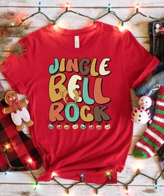 Get festive this holiday season with our exclusive t-shirt! Deck yourself out in cozy and stylish apparel that perfectly captures the spirit of Christmas. Add an extra jingle to your holiday ensemble with this must-have shirt. Looking for other holiday shirts? Click the below link!   https://www.etsy.com/shop/TrueSparkCreations?ref=seller-platform-mcnav&section_id=45358442 This classic unisex jersey short-sleeve tee fits like a well-loved favorite. Soft cotton and quality print make users fall in love with it over and over again. These trendy t-shirts have ribbed knit collars to bolster shaping. The shoulders have taping for better fit over time. Dual side seams hold the garment's shape for longer. High quality, super soft, and super comfy. FABRICATION * Solid Colors: 100% Ringspun Cotton Retro Reindeer, Vintage Reindeer, White Elephant Gifts Exchange, Vintage Family, Holiday Apparel, T Shirt Costumes, Jingle Bell, Classic Holiday, Vintage Vibe