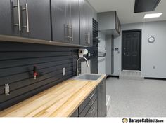 the kitchen is clean and ready to be used as a laundry room or office space