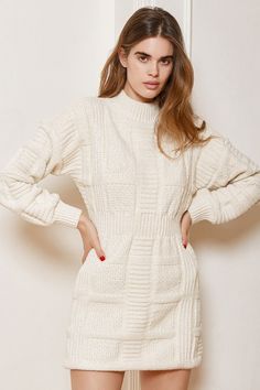 We're loving each and every piece of the Lulus Patchwork It Cream Cable Knit Cutout Sweater Dress! This thick sweater dress has a patchwork-inspired cable knit design that forms a mock neckline, a fitted bodice, and long balloon sleeves with drop shoulders and fitted cuffs. A flirty back cutout tops a bodycon mini skirt. Fit: This garment fits true to size. Length: Mid-thigh. Size medium measures 34" from shoulder to hem. Bust: Great for any cup size. Waist: Fitted - elastic waist allows stretch White Cable Knit Sweater Dress, Cream Sweater Dress, Christmas Outfit Casual, White Knit Dress, Cozy Sweater Dress, Bodycon Mini Skirt, Cutout Sweater, Sweater Dress Outfit, Cable Knit Sweater Dress