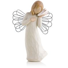 a white ceramic angel figurine with wings