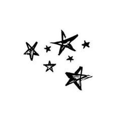 four black and white airplanes flying in the sky with stars on it's side