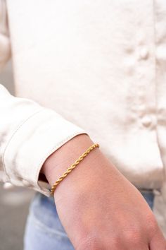 Introducing our all-new Luxe Gold Rope Bracelet – your stylish sidekick for every occasion! Whether you're rocking your favorite jeans and tee combo or glamming up for a night out, this bracelet has got your back. Versatility is the name of the game here. Whether you're a fan of minimalism or love a layered look, this bracelet is your ultimate styling canvas. 18k gold-plated stainless steel Hypoallergenic Tarnish resistant Waterproof PVD Coating Durability Longer lifetime Corrosion resistant 7" Luxury Classic Braided Bracelets For Formal Occasions, Gold Rope Bracelet, Silver Rope Bracelet, Lanyard Wallet, Pvd Coating, Womens Watches Luxury, Got Your Back, Novelty Socks, Cool Socks