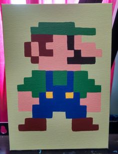 an image of a painting made out of paper mario on a table with pink curtains in the background