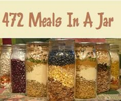 a group of jars filled with food sitting on top of a table next to a sign that says 472 meals in a jar