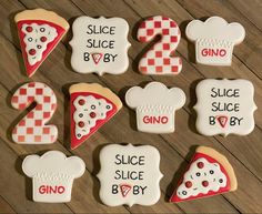 some cookies that are shaped like pizzas and have words written on them to spell out the names